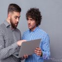 2-men-discussing-online-customer-reviews